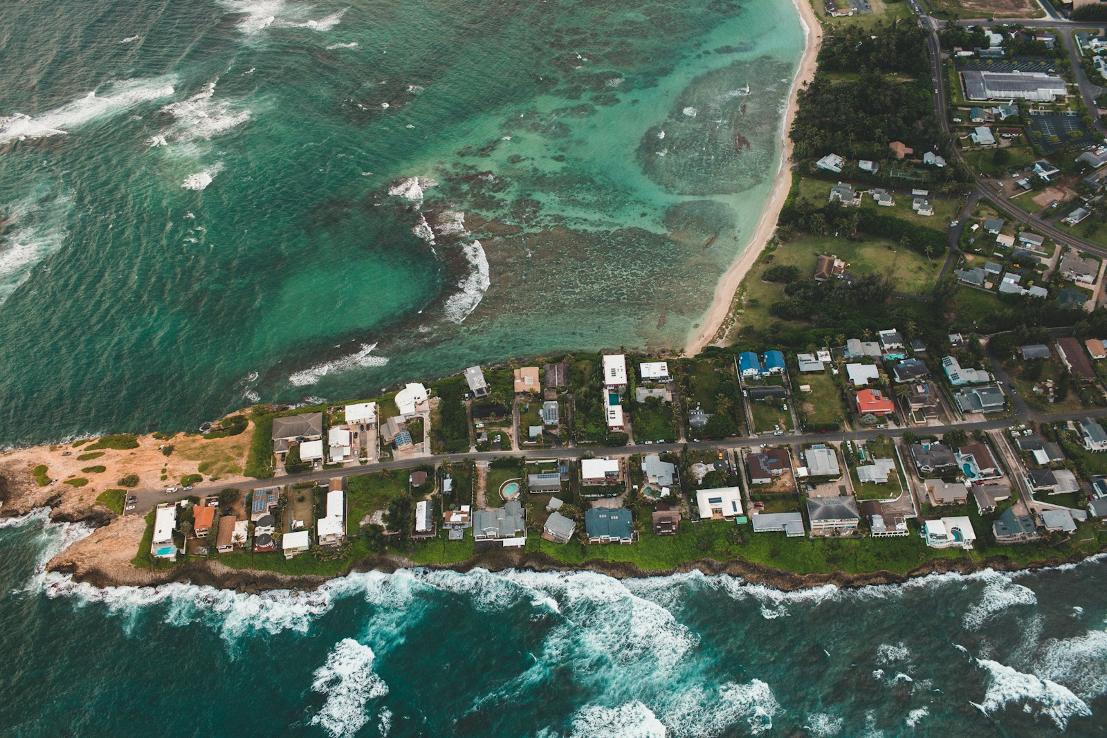 aerial view of village on an island, Coastal Home
